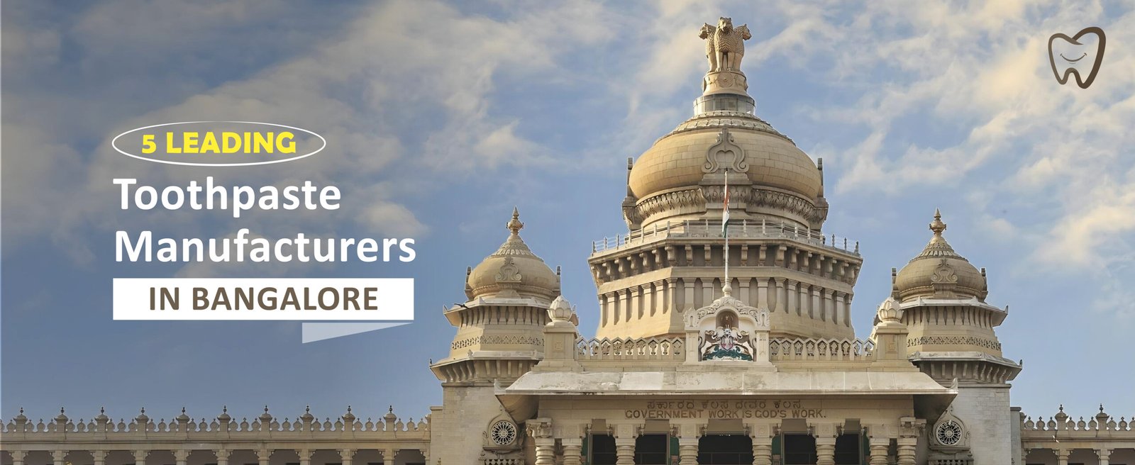 A grand building under a blue sky is featured. Text overlay reads: 5 Leading Toothpaste Manufacturers in Bangalore. A small tooth icon is in the top right corner.